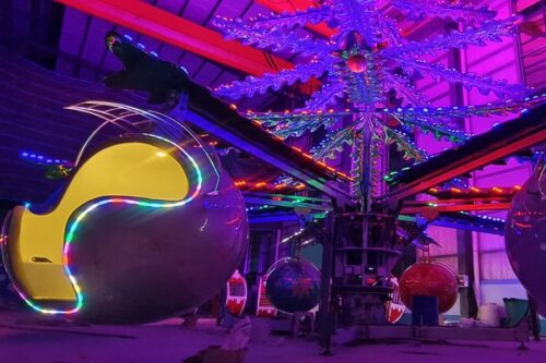 Christmas tree ride lit up at night